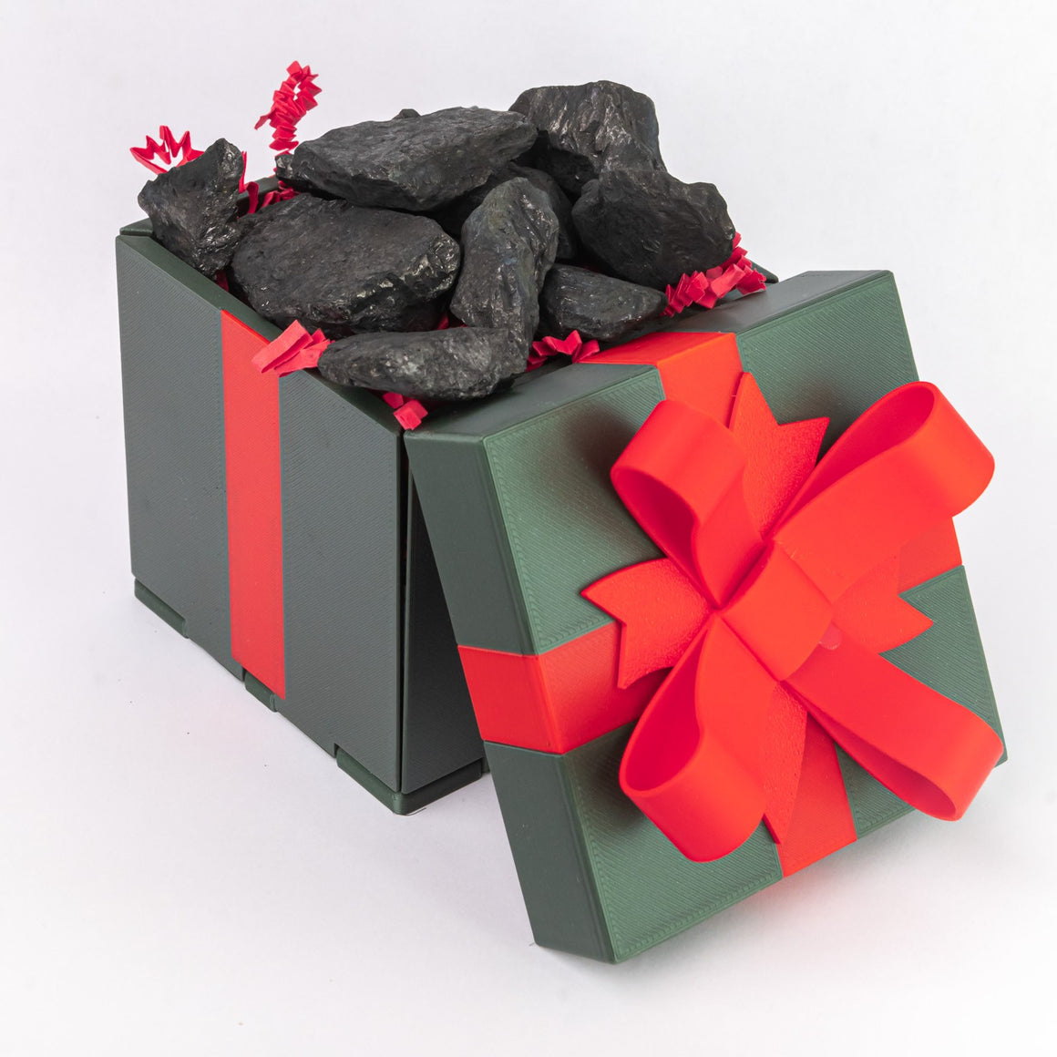 Evergreen closed gift box with a red bow